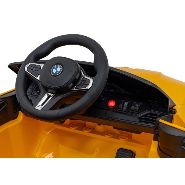 Автомобіль на акумуляторі BMW M4, жовтий